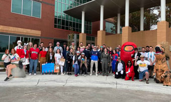 Quantum Workplace employees dressed up in costume for Halloween.